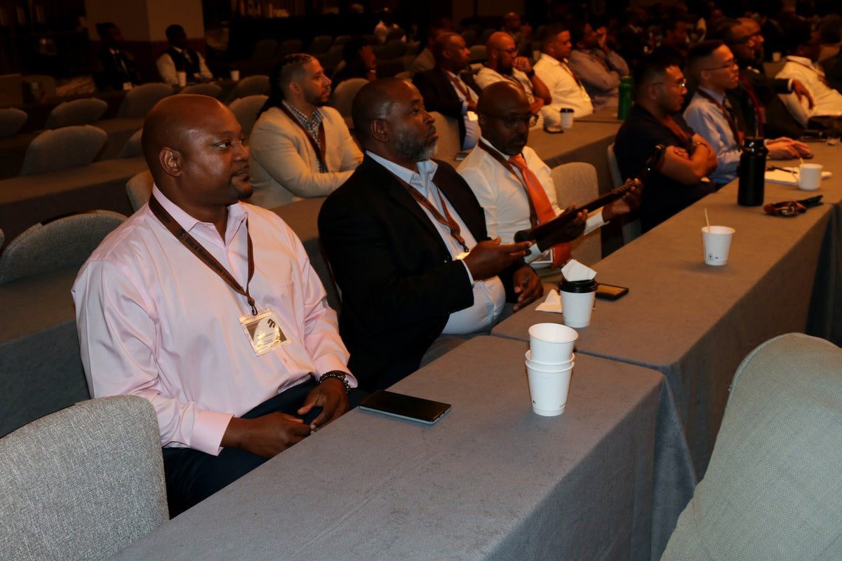 Black Manosphere Conclave audience during a conference session